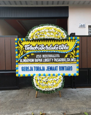 Papan Bunga Duka di Kinilow Satu